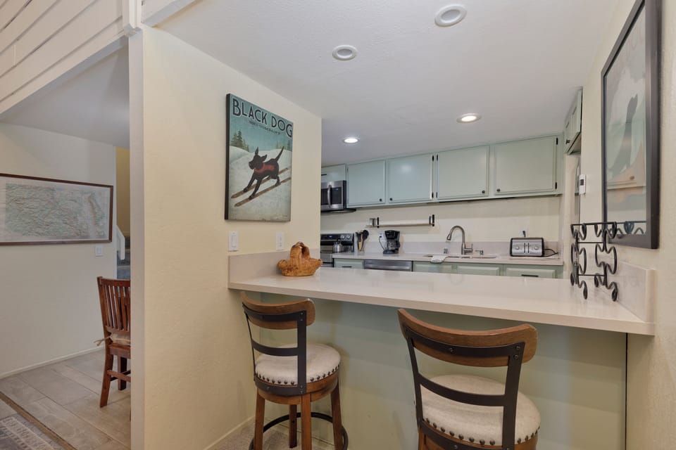 Large quartz counter with stools