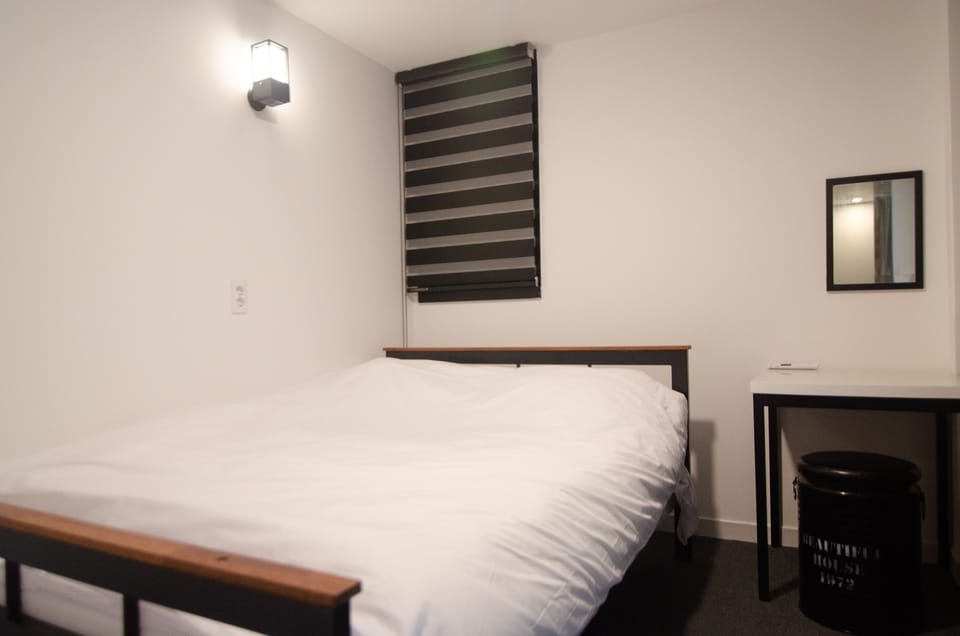 Premium bedding, blackout drapes, soundproofing, free WiFi