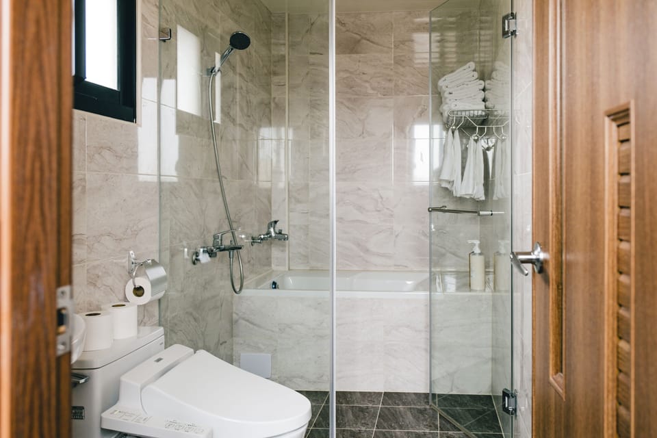 Elite Room, Bathtub (301) | Bathroom | Hair dryer, slippers, bidet