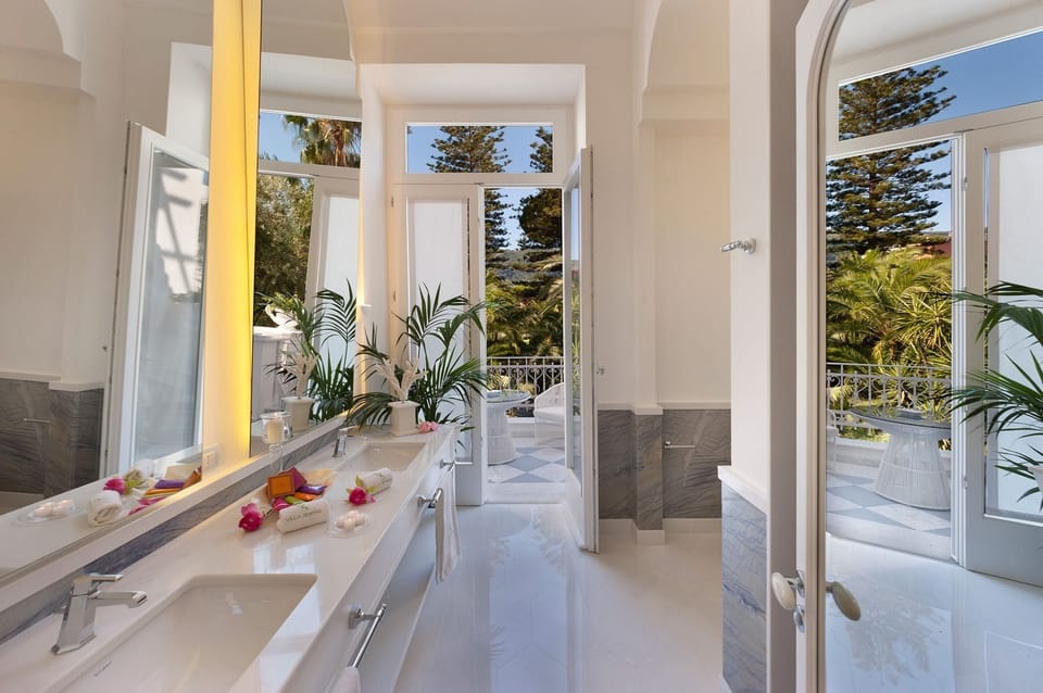 Deluxe Double Room, Terrace | Bathroom | Shower, designer toiletries, hair dryer, slippers