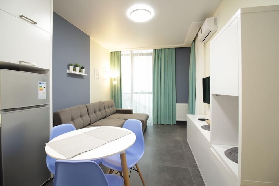 Apartment, 1 Bedroom | Living area | Flat-screen TV