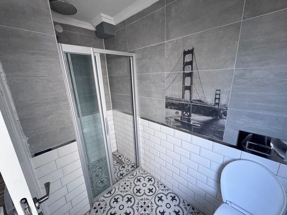 Standard Double Room, Partial Sea View | Bathroom | Shower, free toiletries, hair dryer