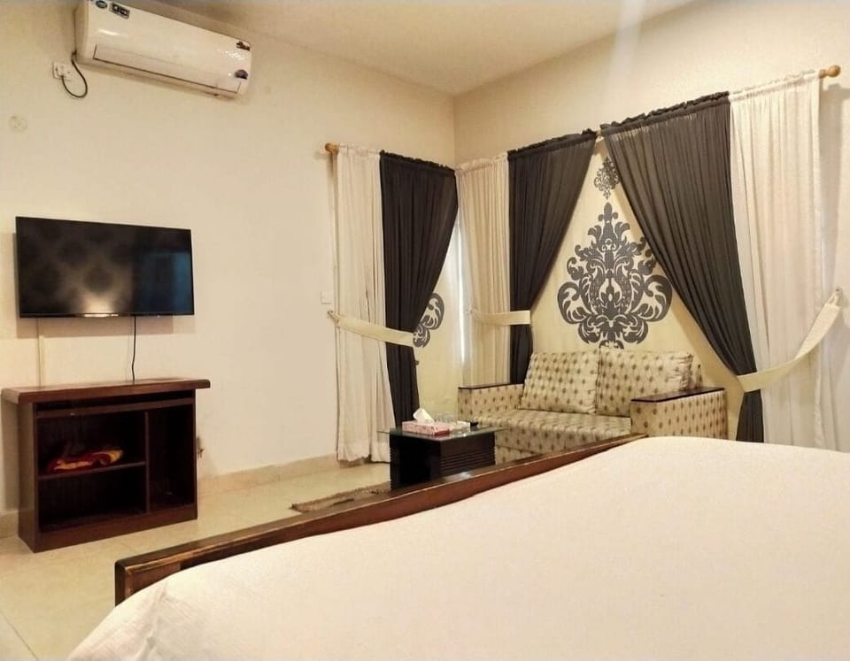 Minibar, desk, laptop workspace, iron/ironing board