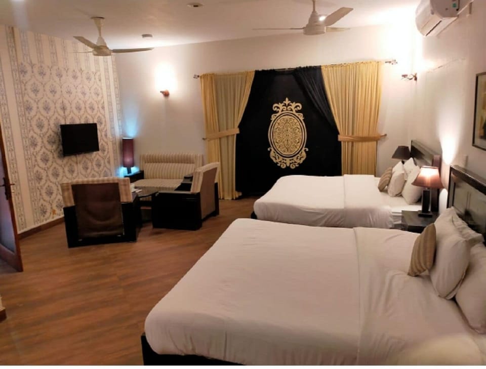 Executive Double Room | Minibar, desk, laptop workspace, iron/ironing board