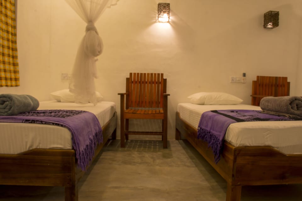 Family Room, Multiple Beds, Balcony, Garden View | In-room safe, desk, blackout drapes, soundproofing