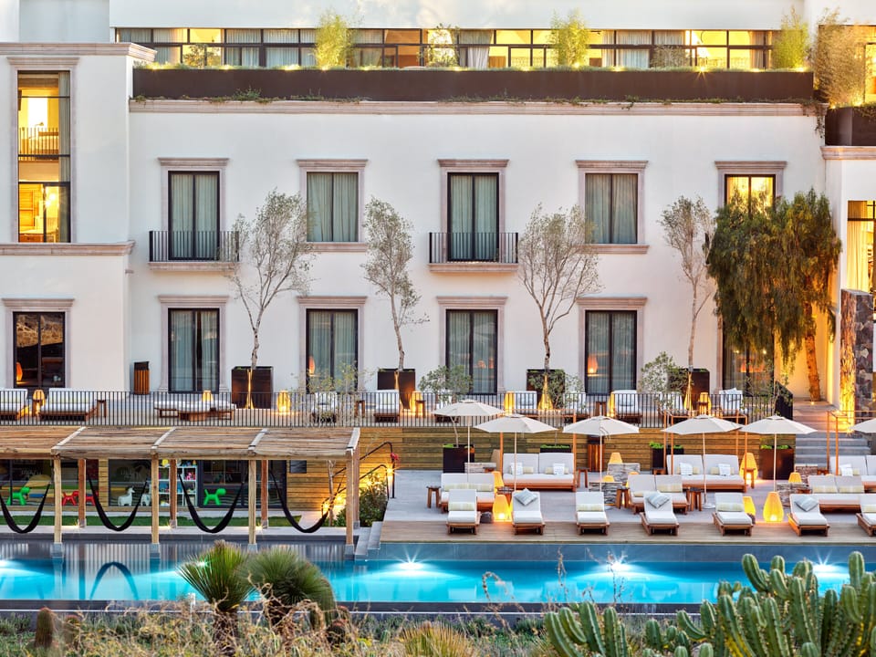 Outdoor pool, free cabanas, pool umbrellas