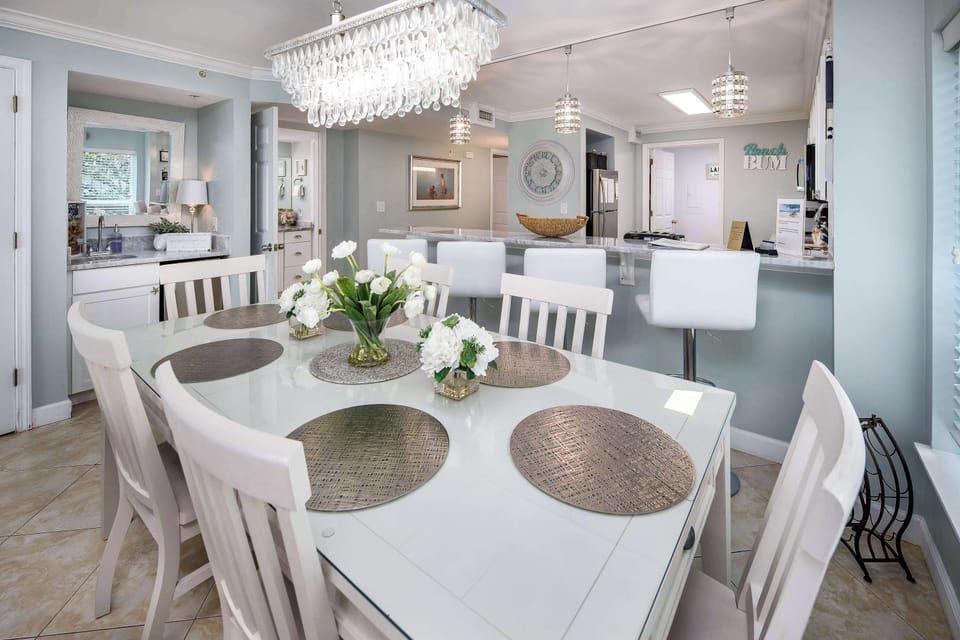 Dining area with seating for six and wet bar