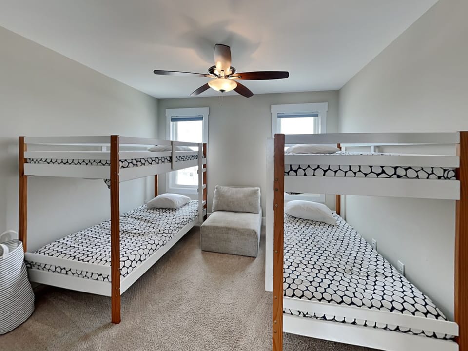 Fifth Bedroom - (2) Twin/Twin Bunk Beds + Shared Ensuite Bathroom - First Floor