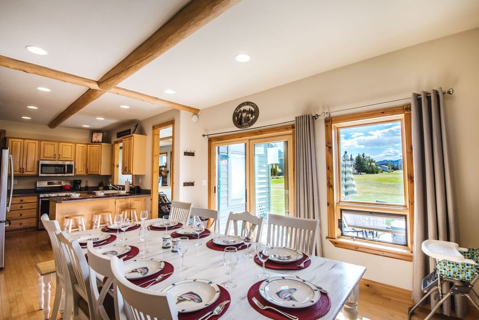 Open kitchen with spacious dining room for friends and family to congragate.