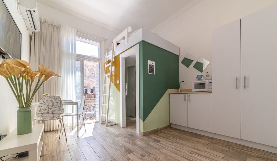 Superior Studio with Balcony | Minibar, in-room safe, individually decorated, individually furnished