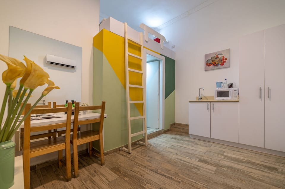 Economy Double Room, No Windows | Minibar, in-room safe, individually decorated, individually furnished
