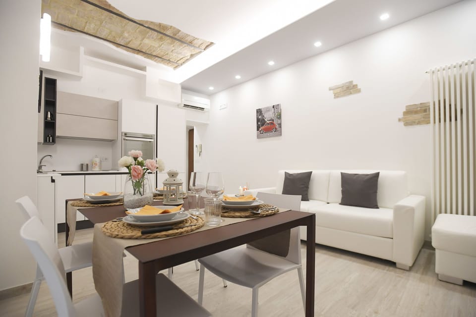Apartment, 1 Bedroom | Living area | Flat-screen TV
