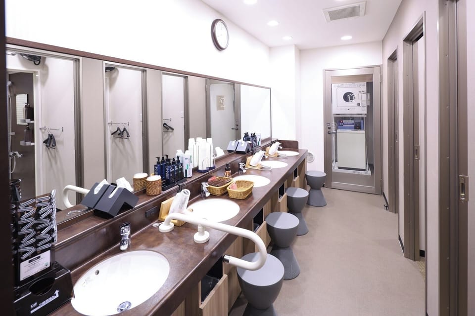 Shower, free toiletries, slippers, towels