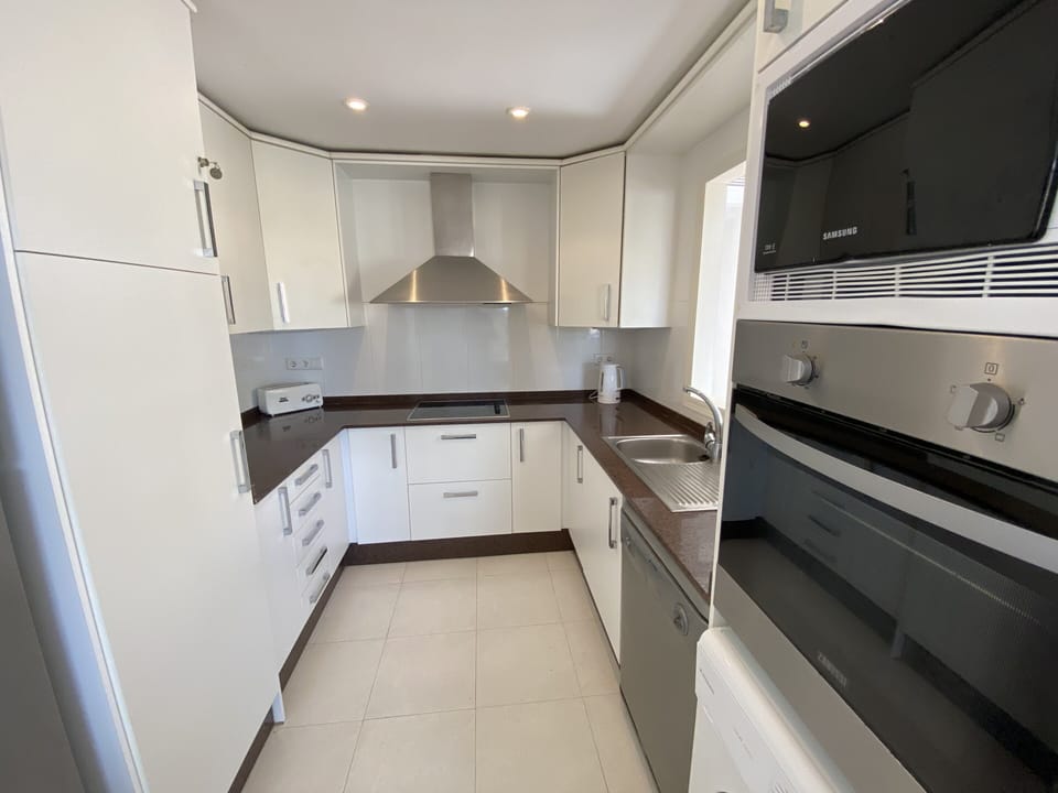 Full kitchen with 2 fridges 2 freezers dishwasher washing machine, coffee maker.