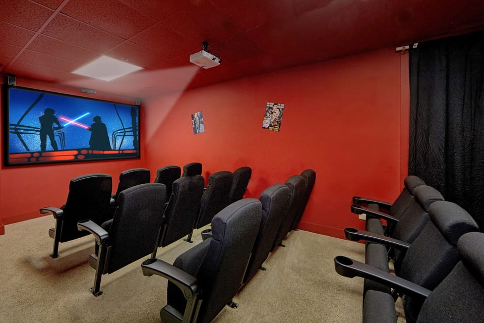 Home movie theater, 100” HD Projector, HDVD Player, HD Cable, and laptop hookup.