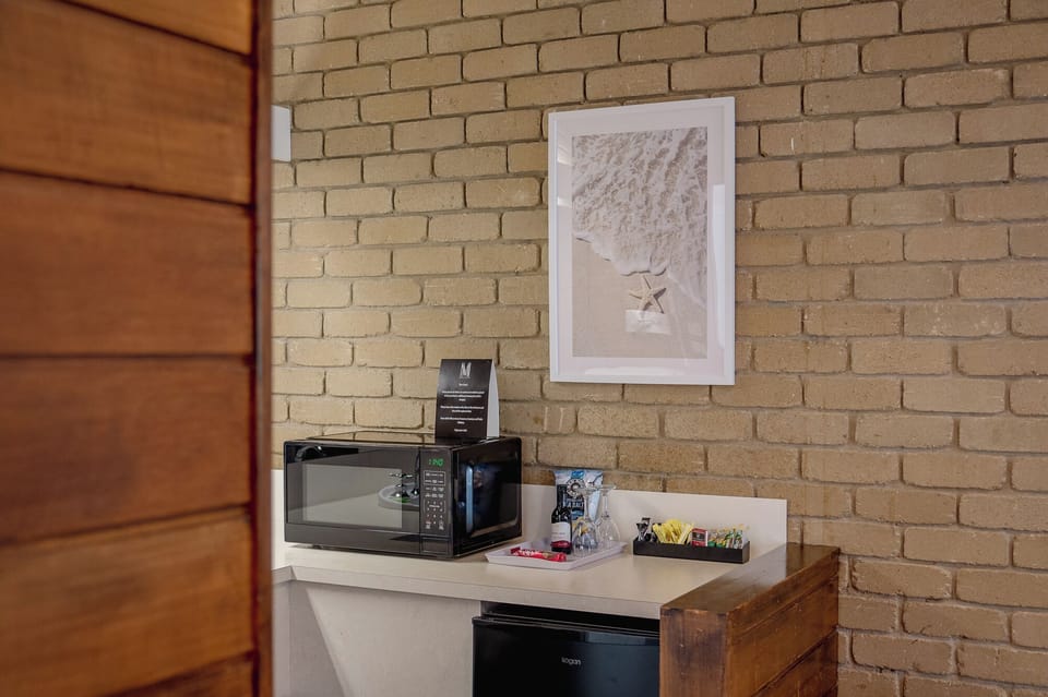 Superior Two Bedroom Family Apartment | Living area | 32-inch TV with cable channels