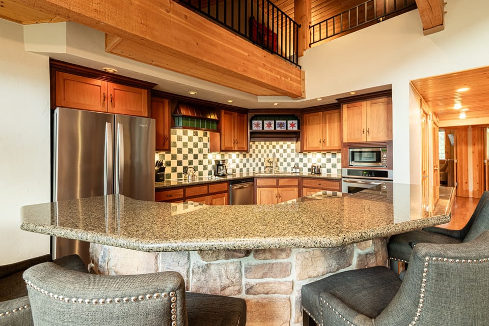 Fully equipped kitchen and a center island with seating for 4
