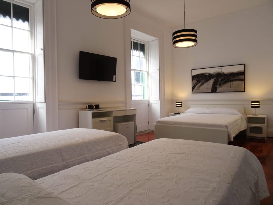 Family Quadruple Room, Balcony, City View (3) | Minibar, individually decorated, desk, blackout drapes