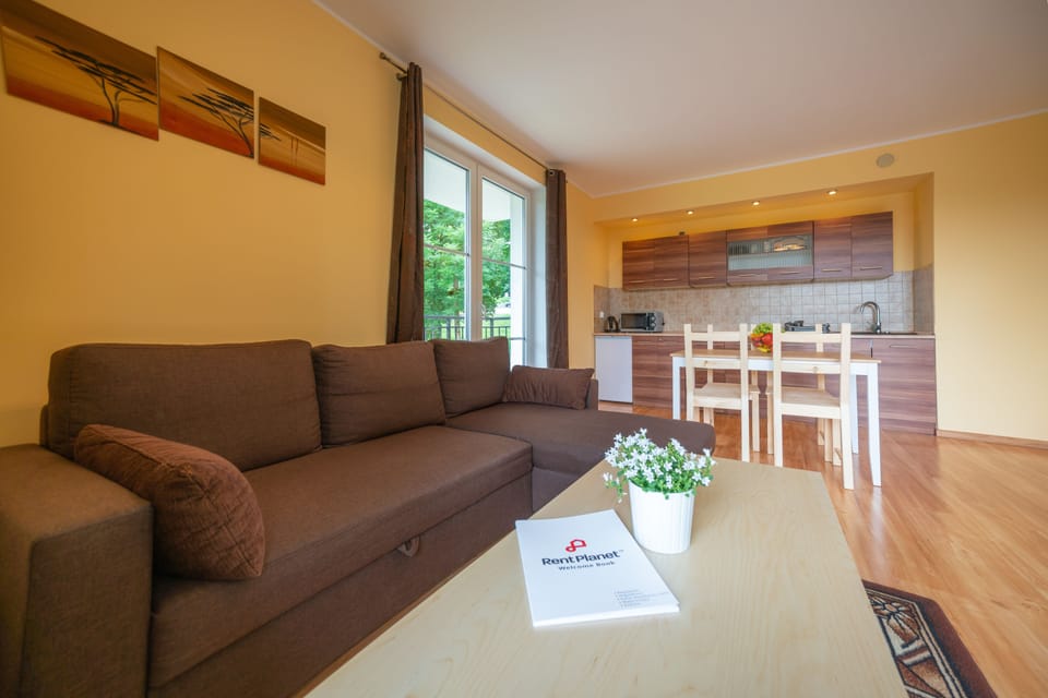 Comfort Apartment, 1 Bedroom, City View | Living room | Flat-screen TV