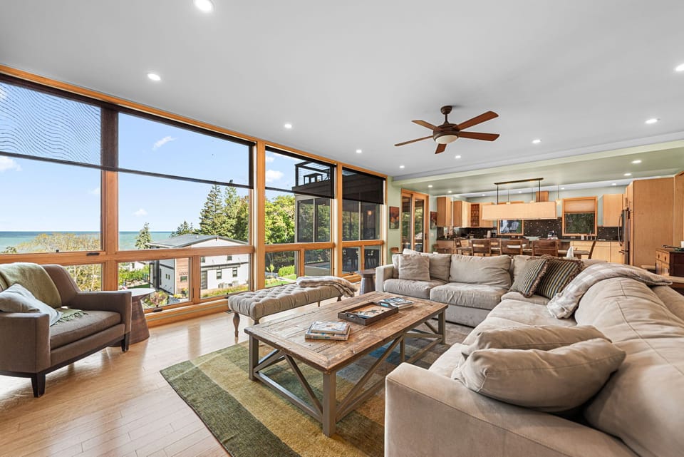 Living room with oversized sectional and amazing lake views