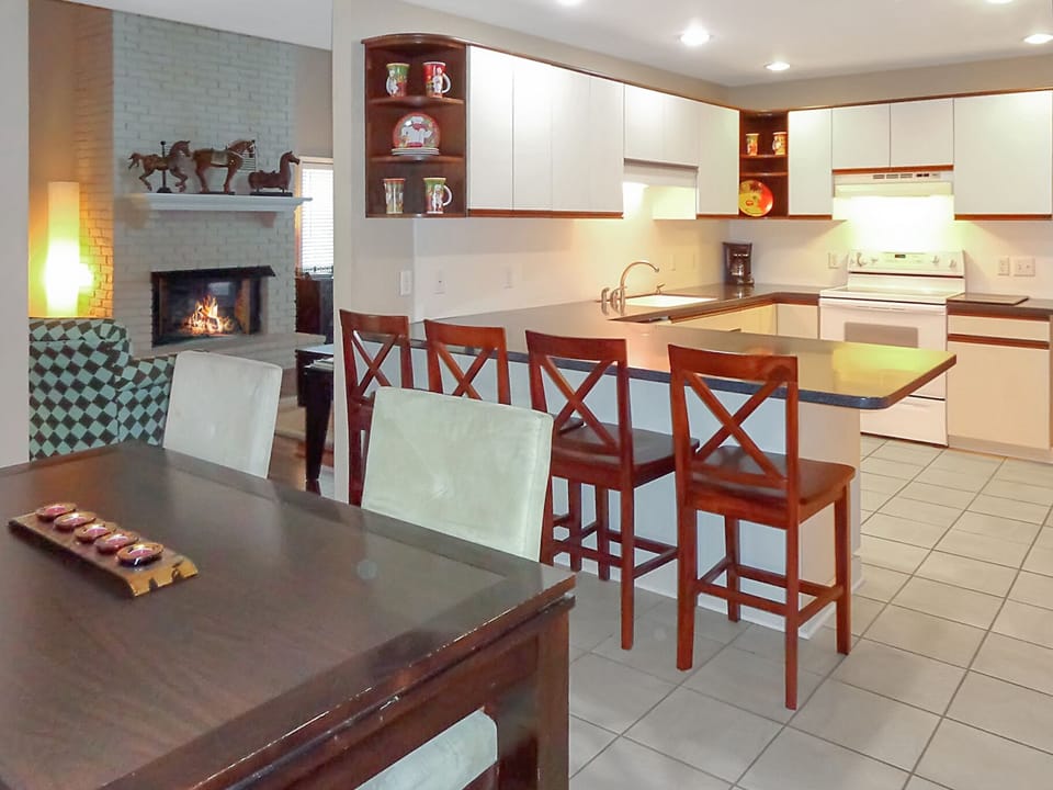 There's seating for four at the dining table and four at the bar counter.