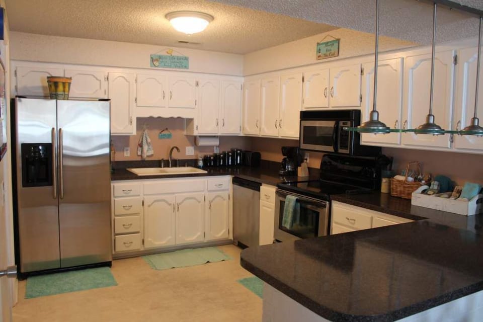 Spacious kitchen with newer appliances.