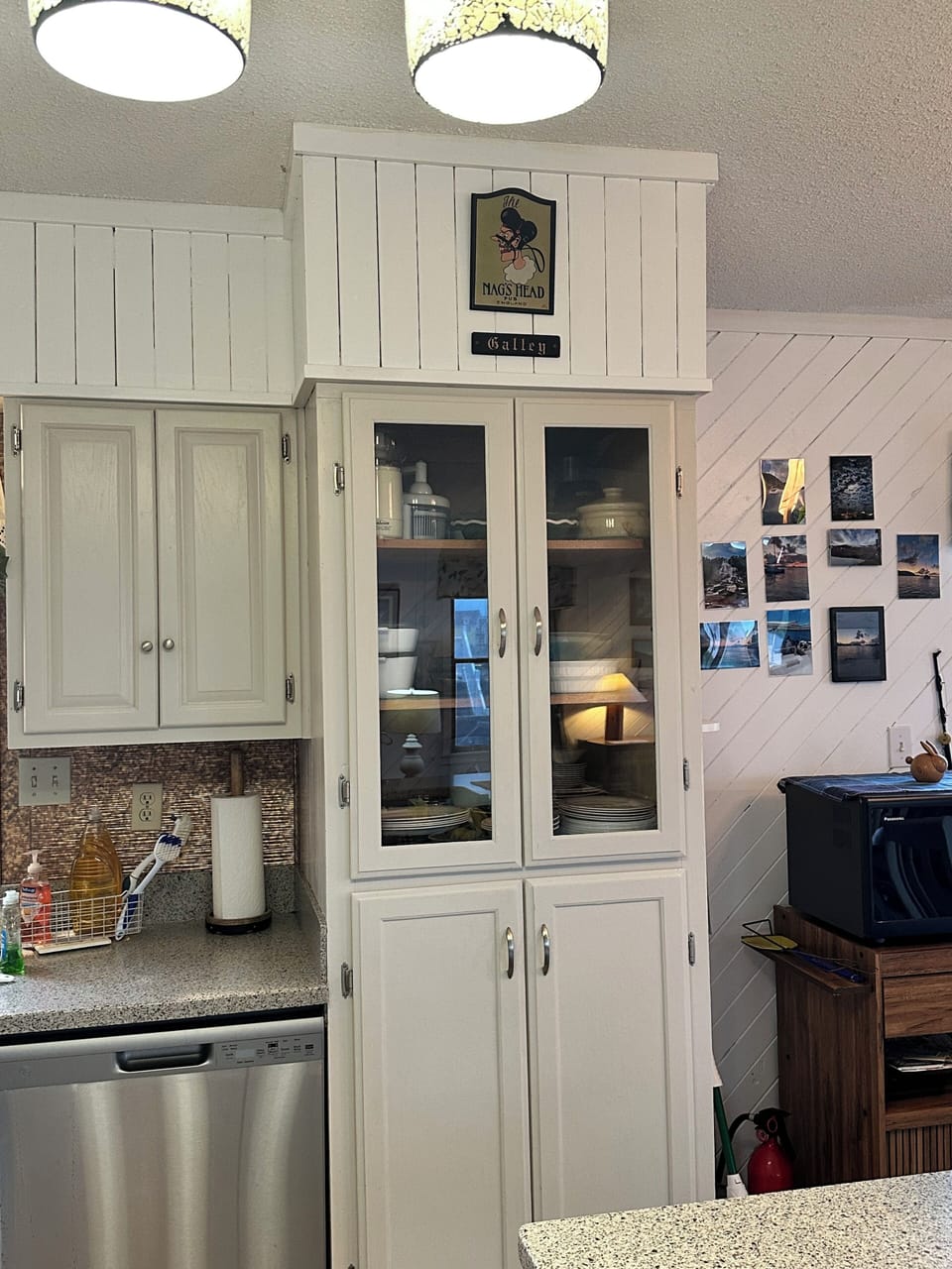 Cupboard dishes, pots and pans 