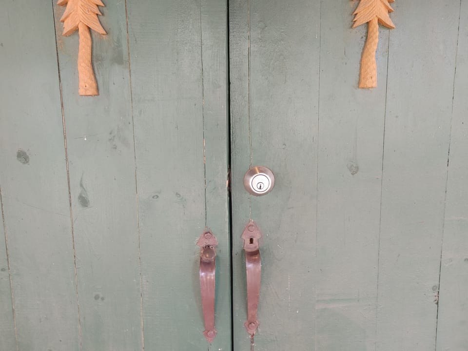 Security door with deadbolt