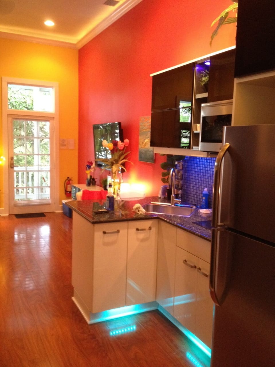 KITCHEN, LOOKING INTO LIVING ROOM,  14 FT CEILING,  STAINLESS STEEL APPLIANCES