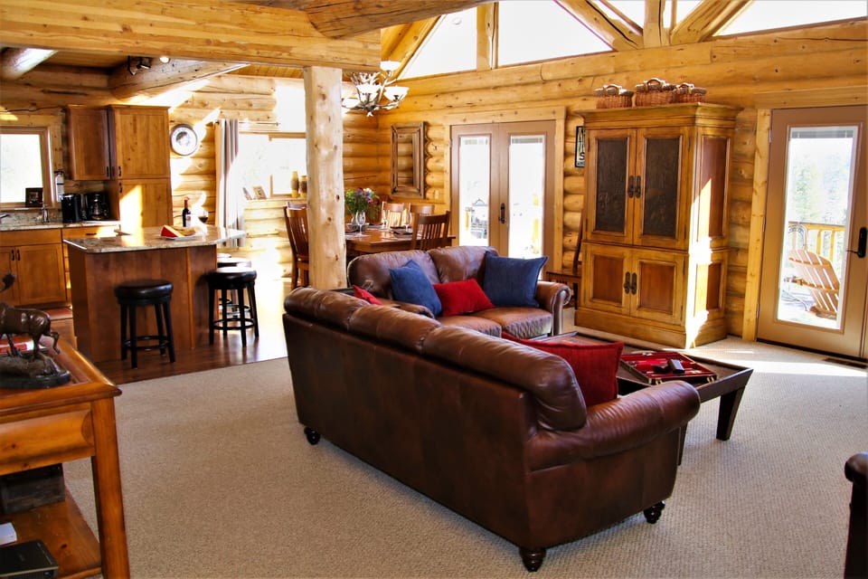 Comfy seating area with smart TV & bluetooth speaker.