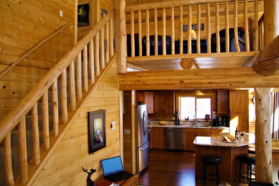 Stairs to loft & secret toy room for the kids -toy chest/tent/pillows/blocks! 