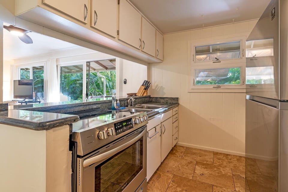 New stove and refrigerator added to kitchen