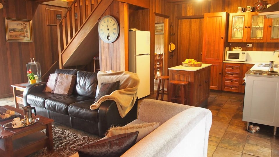 View of the kitchen and stairs to the upstairs