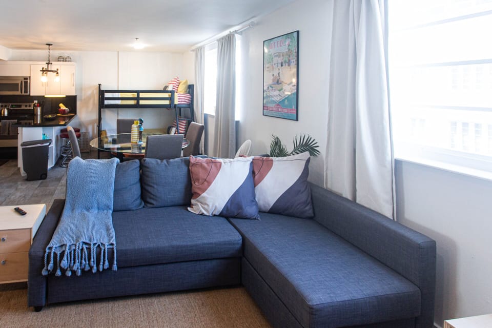 Living room sofa pulls out to a queen size bed.