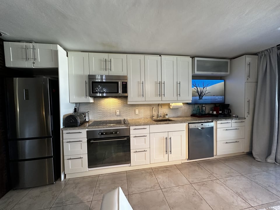 Kitchen with all the amenities and fully stock.