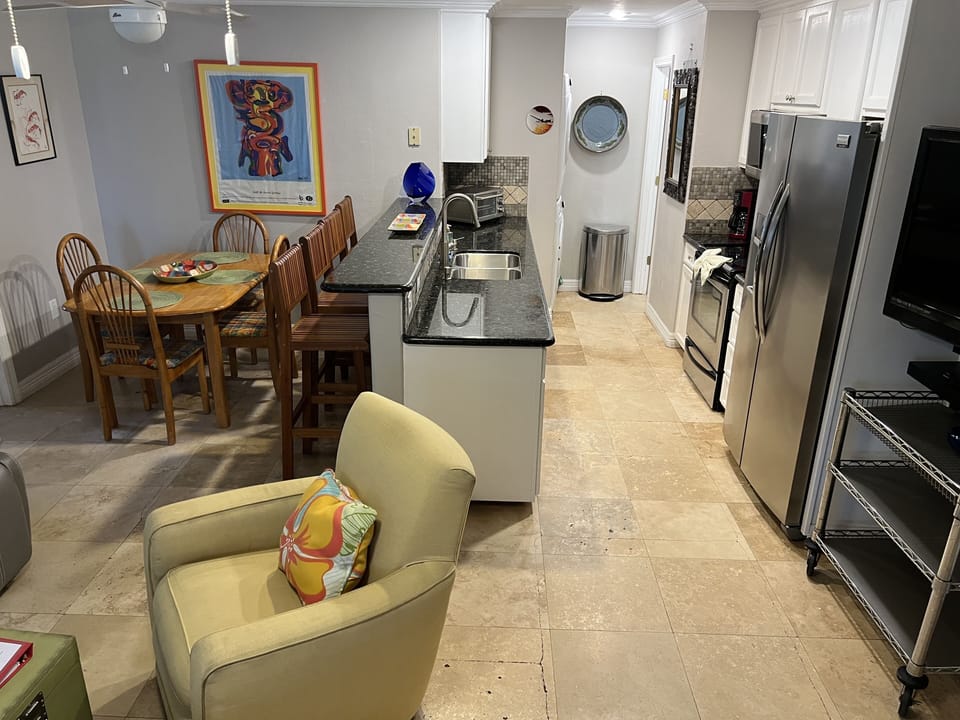 Open floor plan allows conversation between kitchen and family room. 