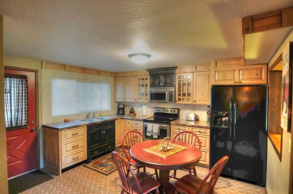 Beautiful cabinets and counter with new appliances.