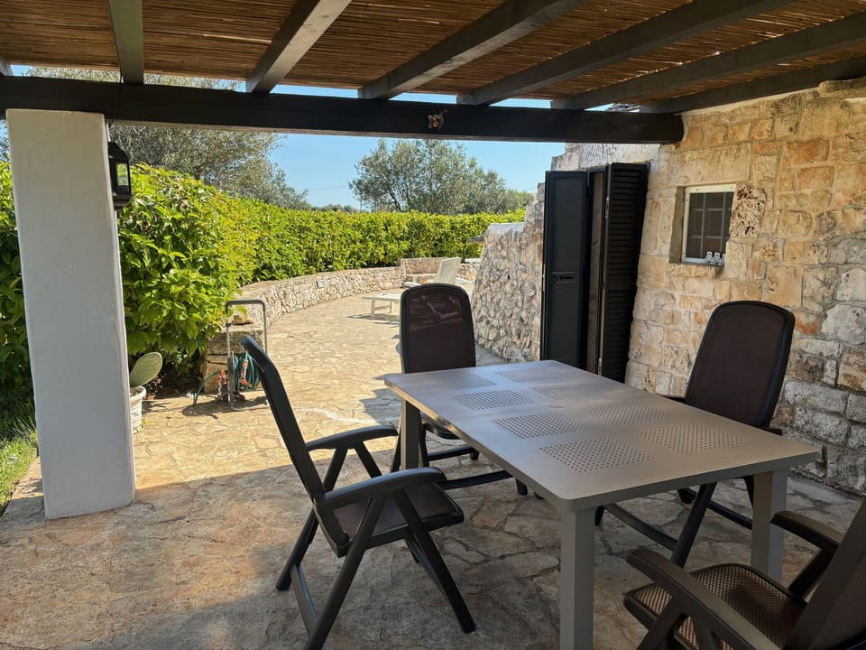 Outside dining area and Gazebo with a view of the front patio area