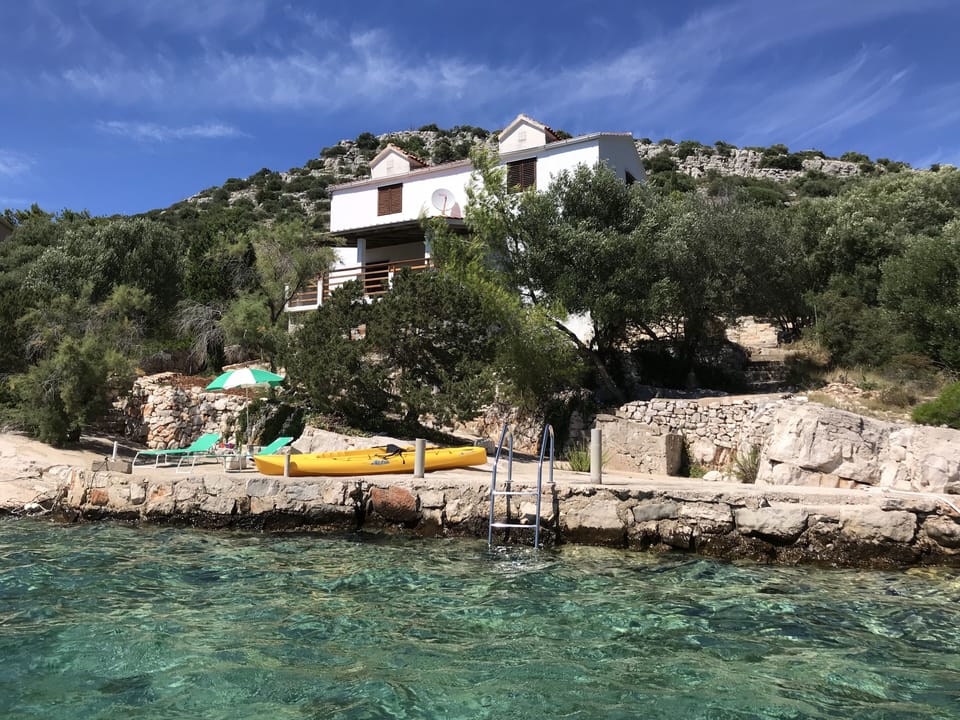 Villa with Beachfront, Kayak, Chaise Lounges, Sun Umbrella & Ladder to Sea