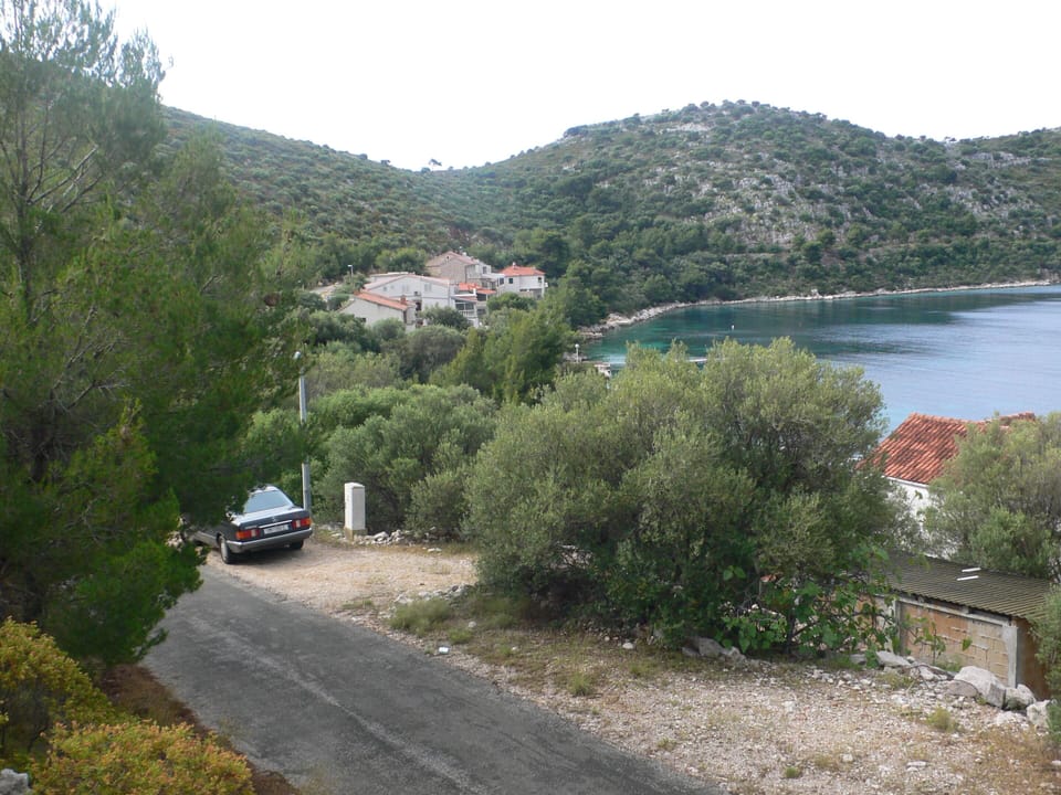 Off street parking above the house.