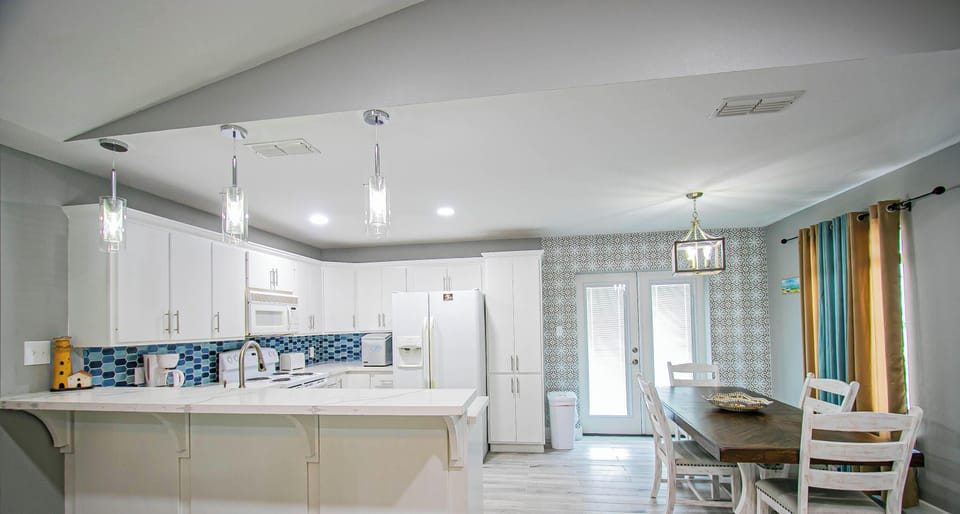 Top- Kitchen and Dinning Area 