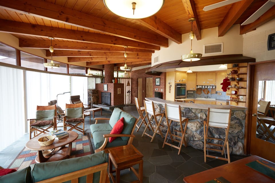 View of living room and bar/kitchen
