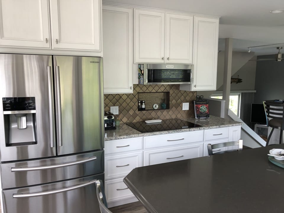 5 burner stove plus micro hood.