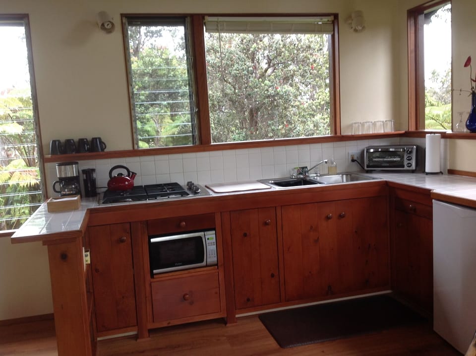 Kitchen fully equipped with propane stove, microwave, toaster oven &refrigerato