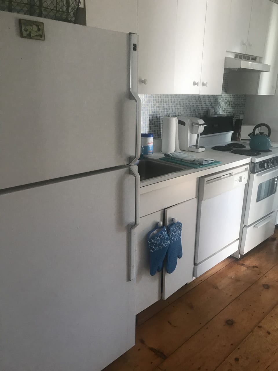 Kitchen With Fridge, Stove , Dishwasher