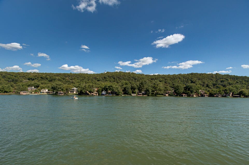 Lake Austin, directly behind the house. 