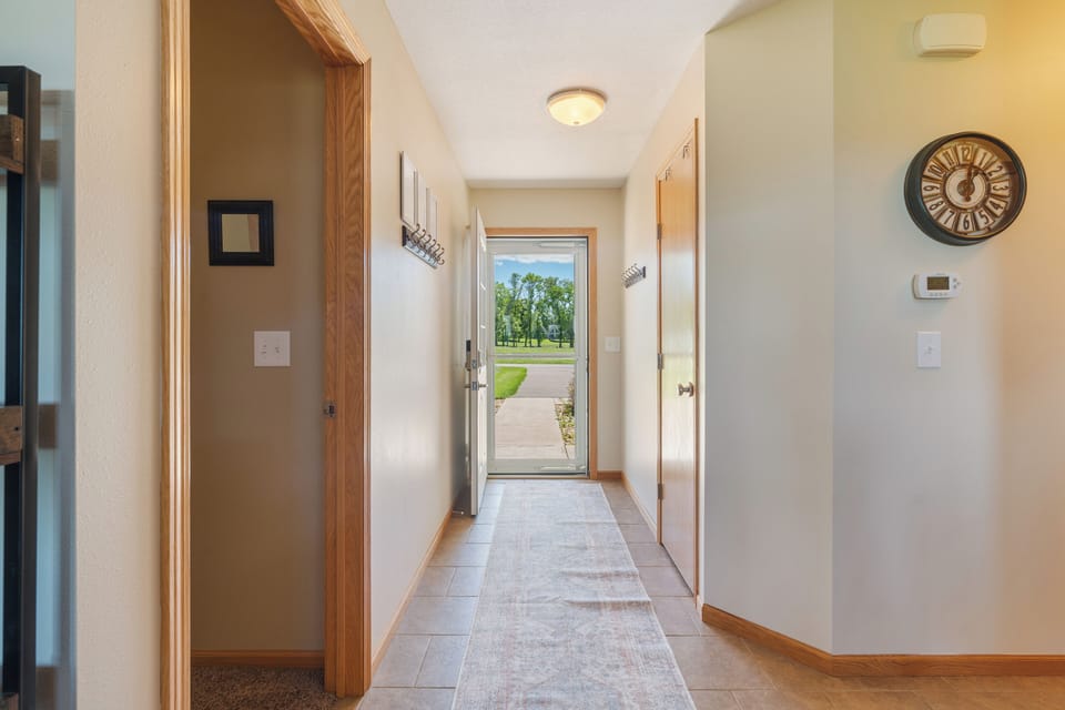 Entrance opens up to playground, and tennis and pickleball courts.