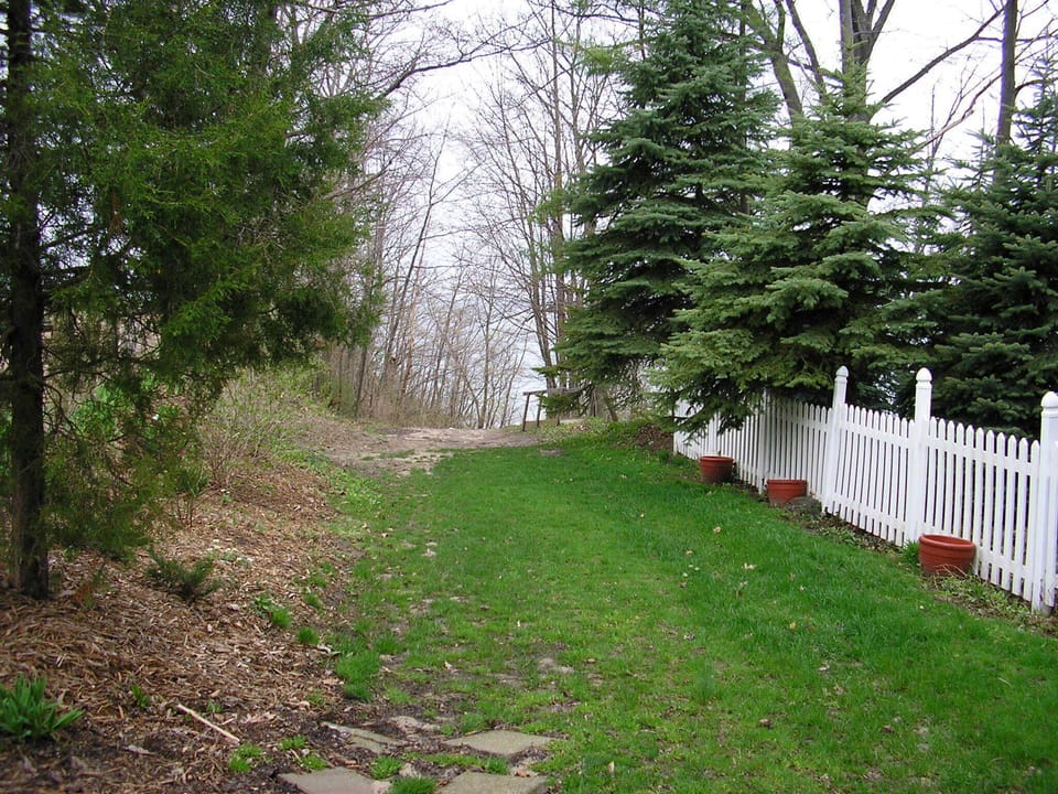 grassy slope to beach