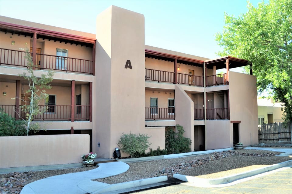Unit 214 is an end unit located in Building A