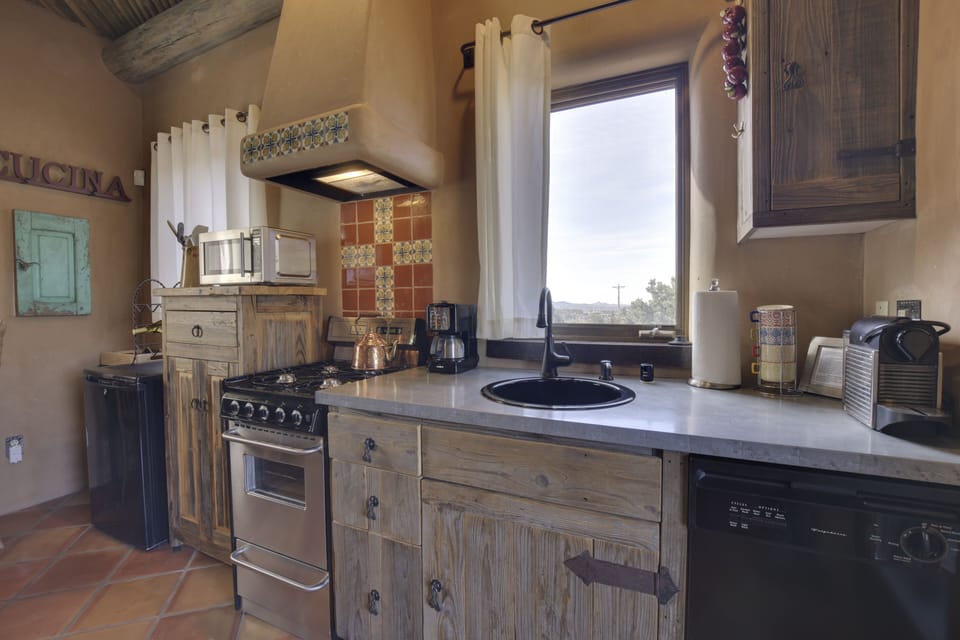 Kitchen Area- Full stove & oven, dishwasher, refrigerator.